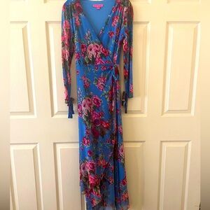 Betsey Johnson wrap dress. Drapes beautifully.  Very roomy w a nice stretch.